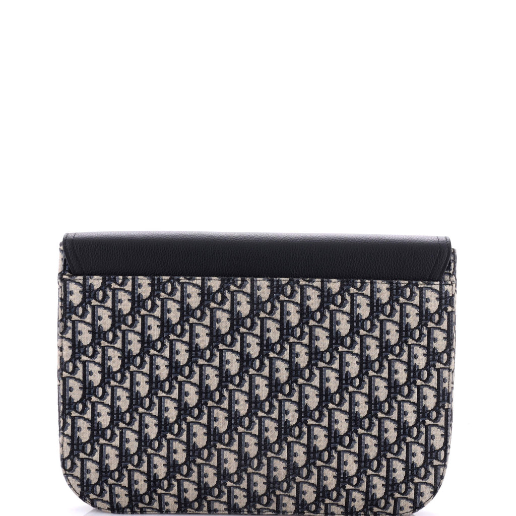Saddle A4 Clutch Oblique Canvas and Leather