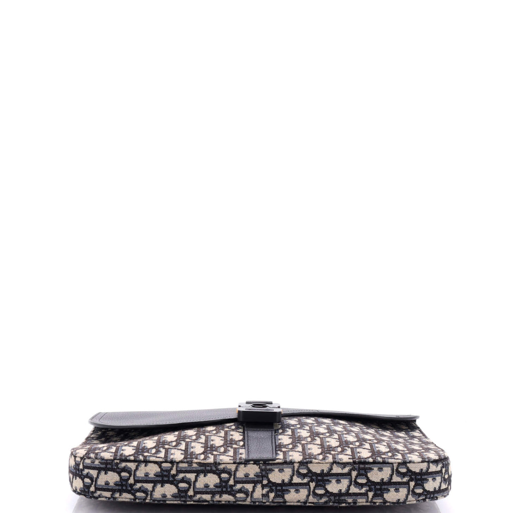 Saddle A4 Clutch Oblique Canvas and Leather