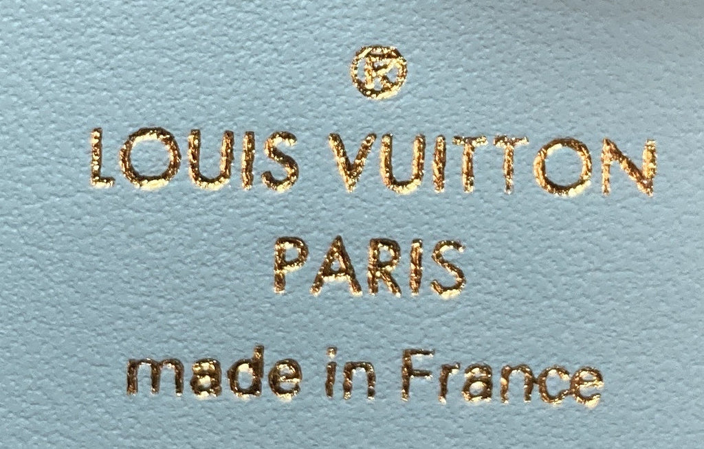 LV Vertical Wallet Taurillion Leather Compact