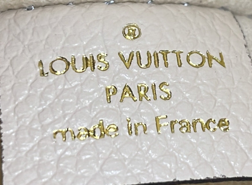 Neverfull Pochette Monogram Empreinte Giant Large