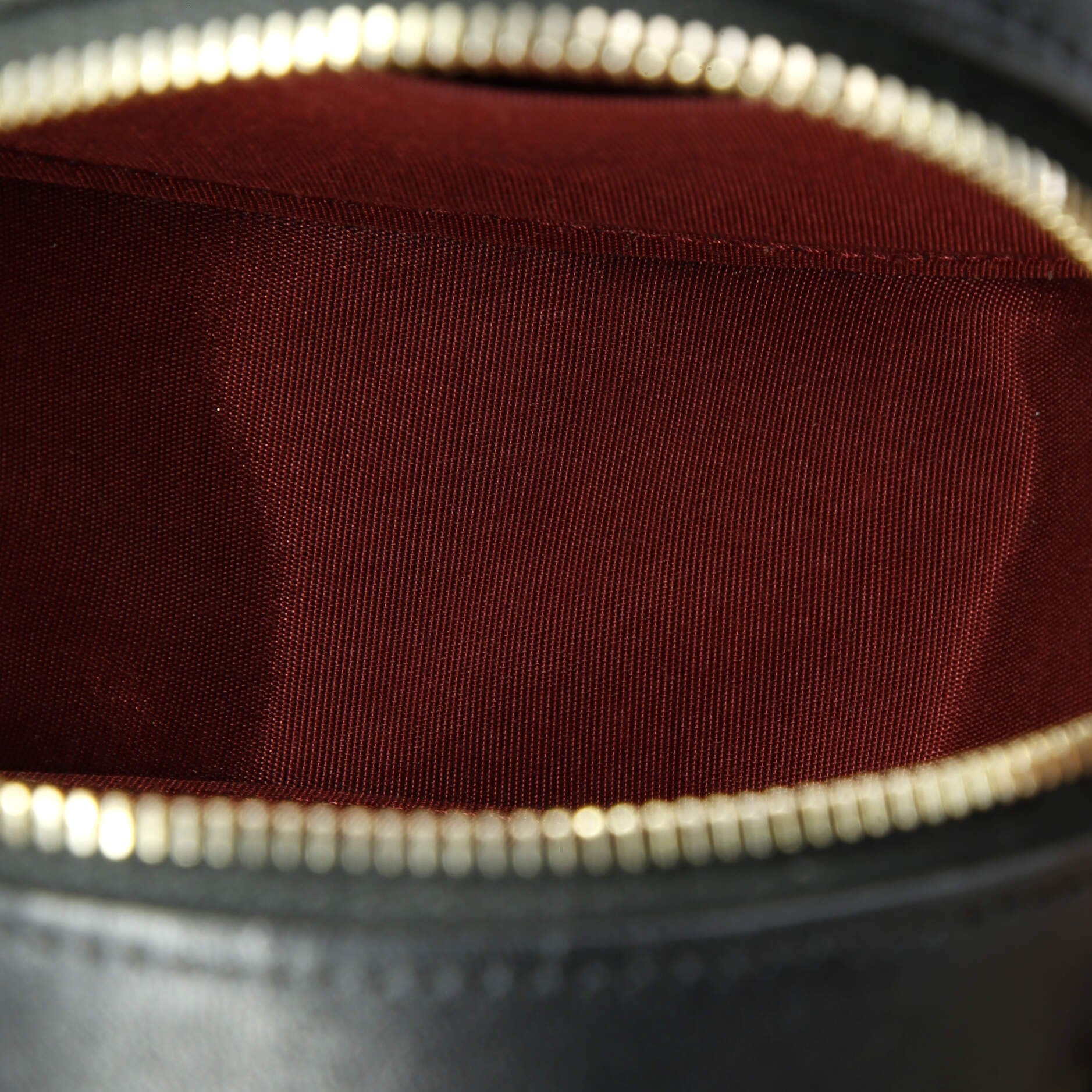 19 Round Clutch with Chain Quilted Leather
