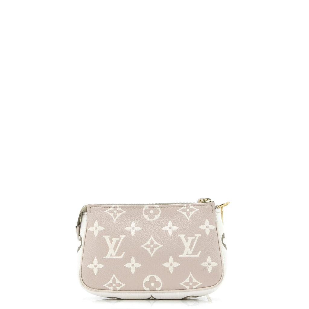 Pochette Accessoires Spring in the City Monogram Empreinte Leather Mini