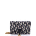 Saddle Chain Clutch Oblique Canvas