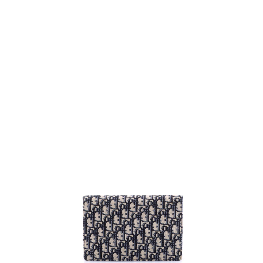 Saddle Chain Clutch Oblique Canvas
