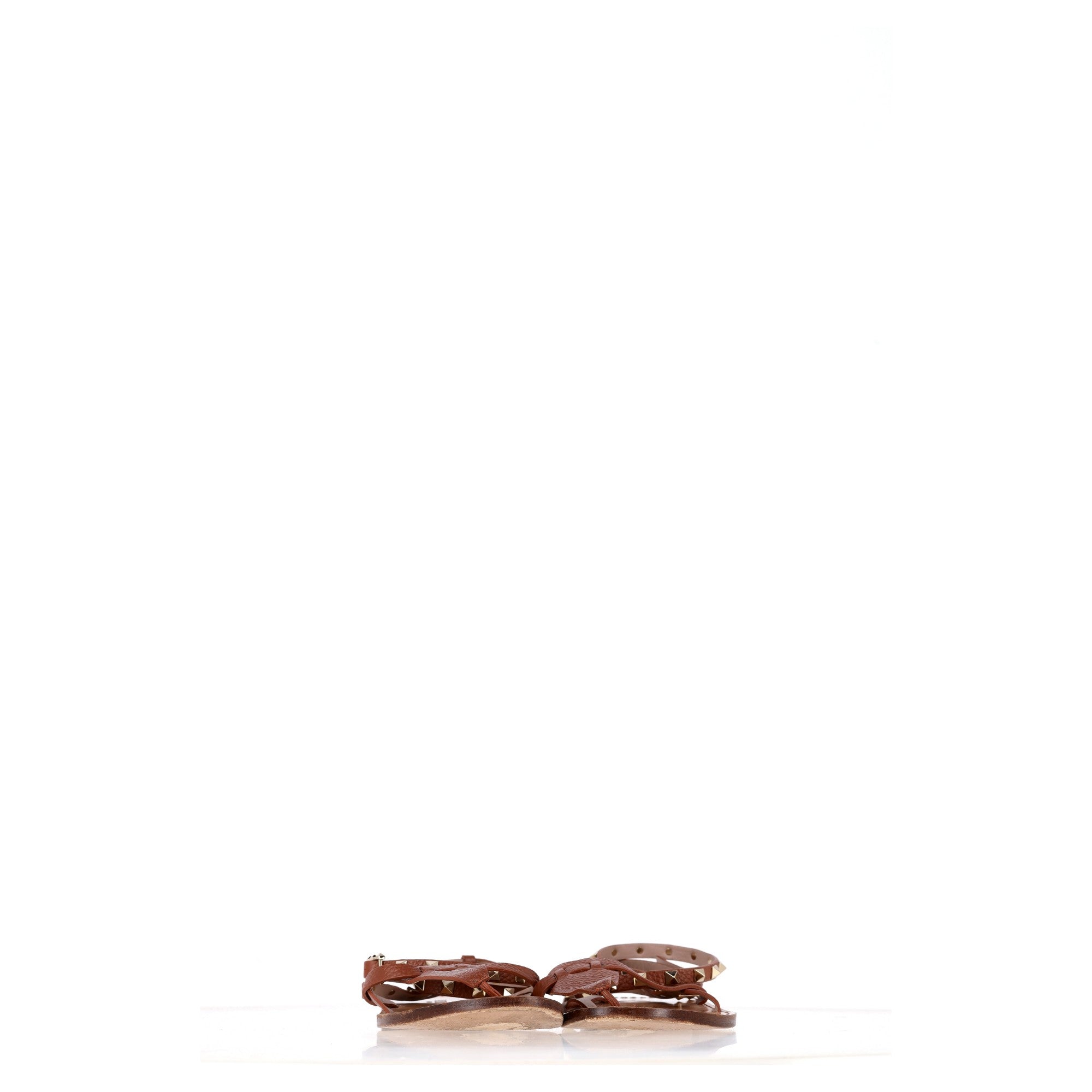 Valentino Garavani Rockstud T-Strap Flat Sandals in Brown Leather