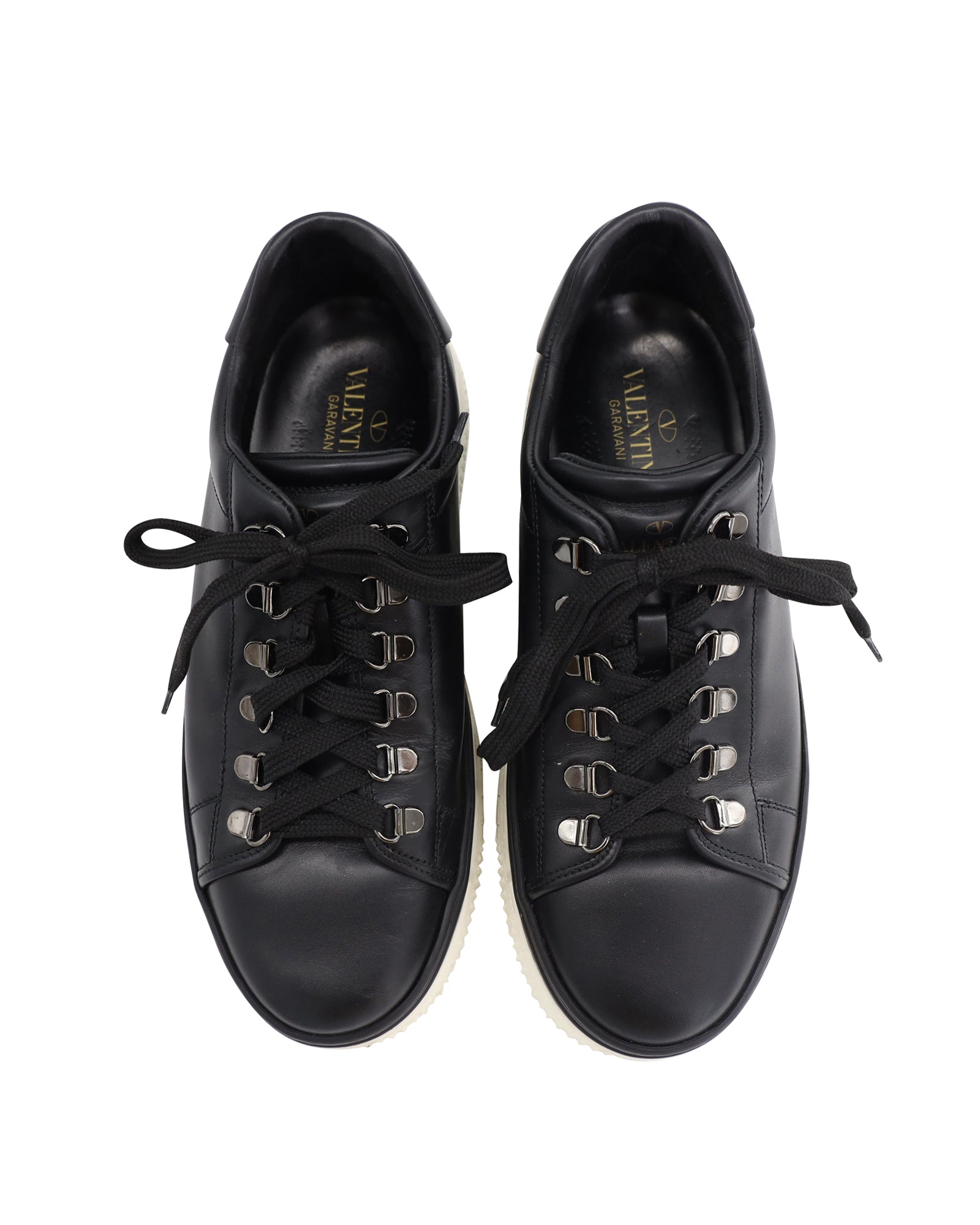 Valentino Garavani Low Top Sneakers in Black Leather