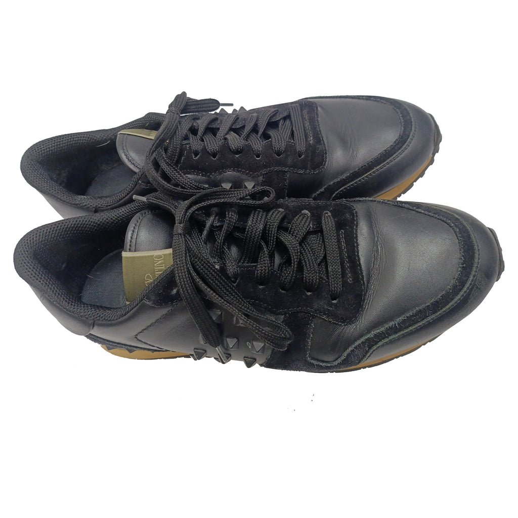 Valentino Garavani Rockrunner Low-Top Sneakers in Black Calf Leather